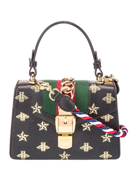 Gucci Bee Star Mini Sylvie Top Handle Bag .